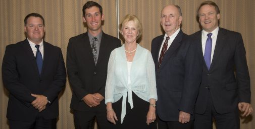 Russell Harmening with coach Rob Ruiz, the Jordano's and President Beebe 