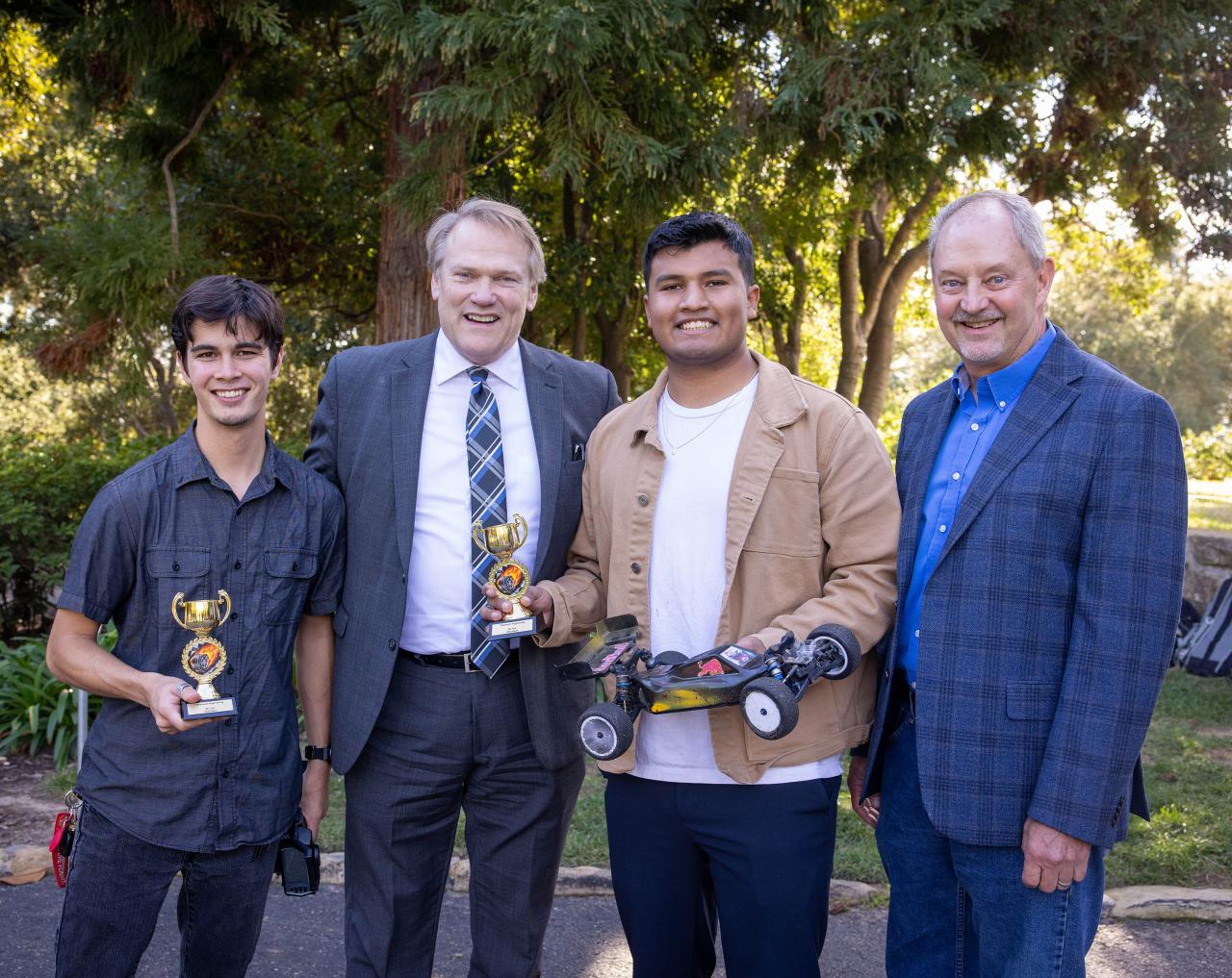 Ben Mandani, president Gayle D. Beebe, Isaac Silva and director Dan Jensen